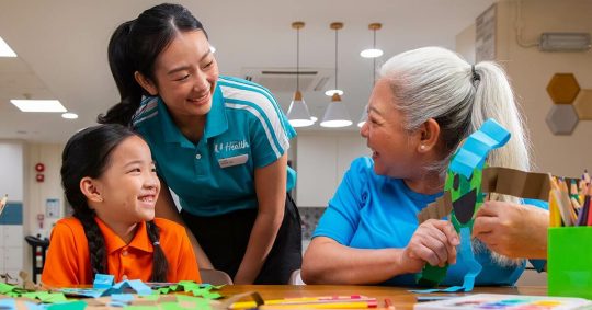 senior-doing-crafts-with-preschooler-and-staff1200x628.jpg