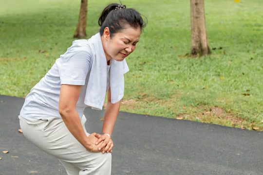 female-senior-bending-down.jpg